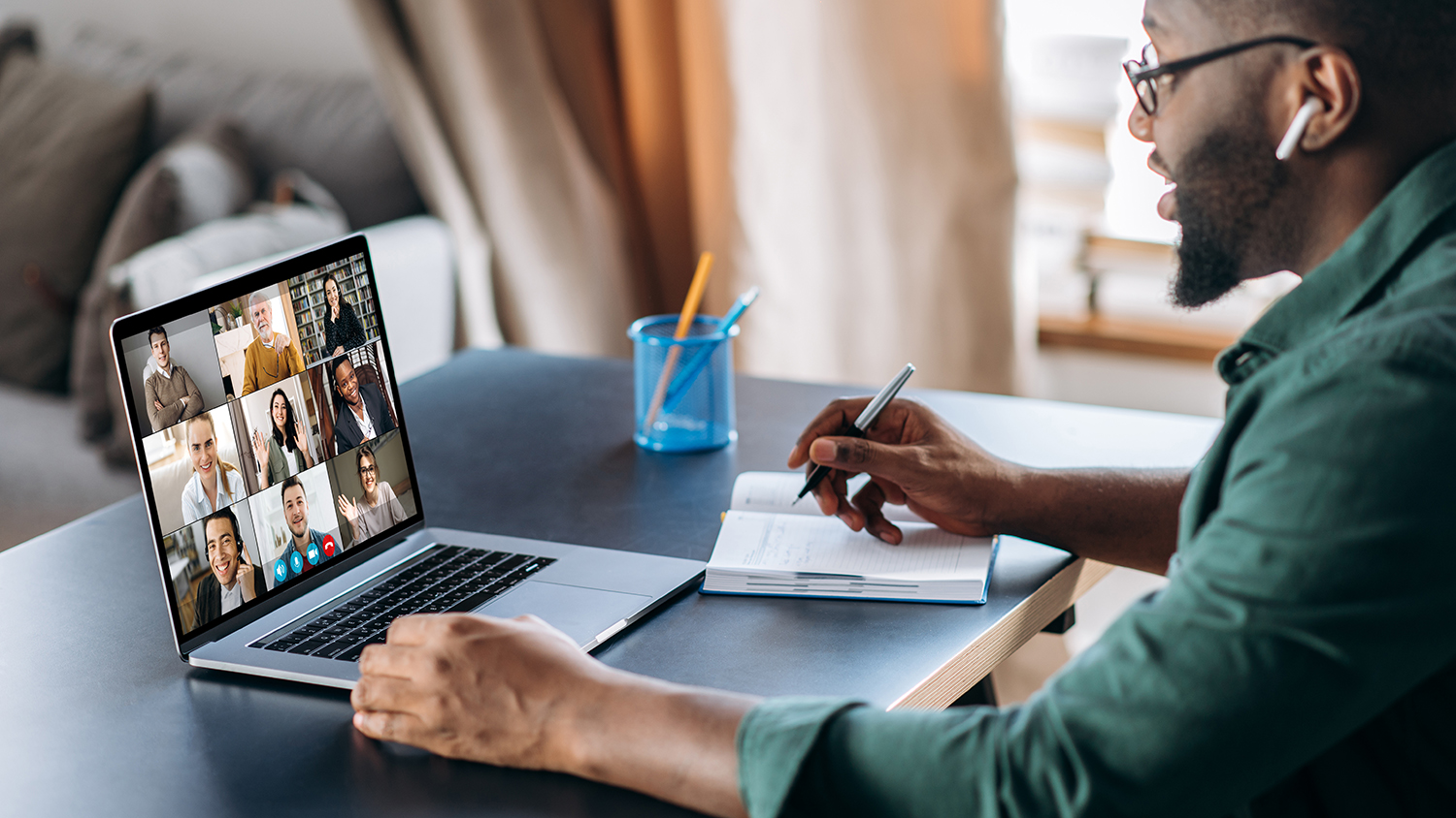 person attending virtual webinar
